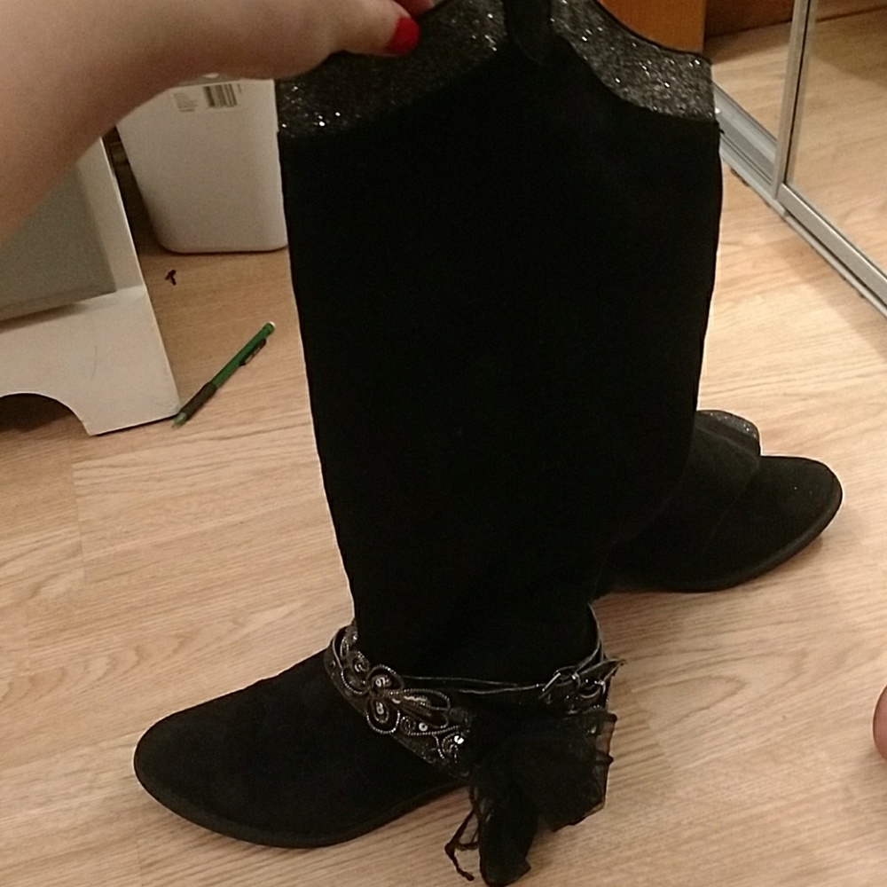 Tall black suade boots